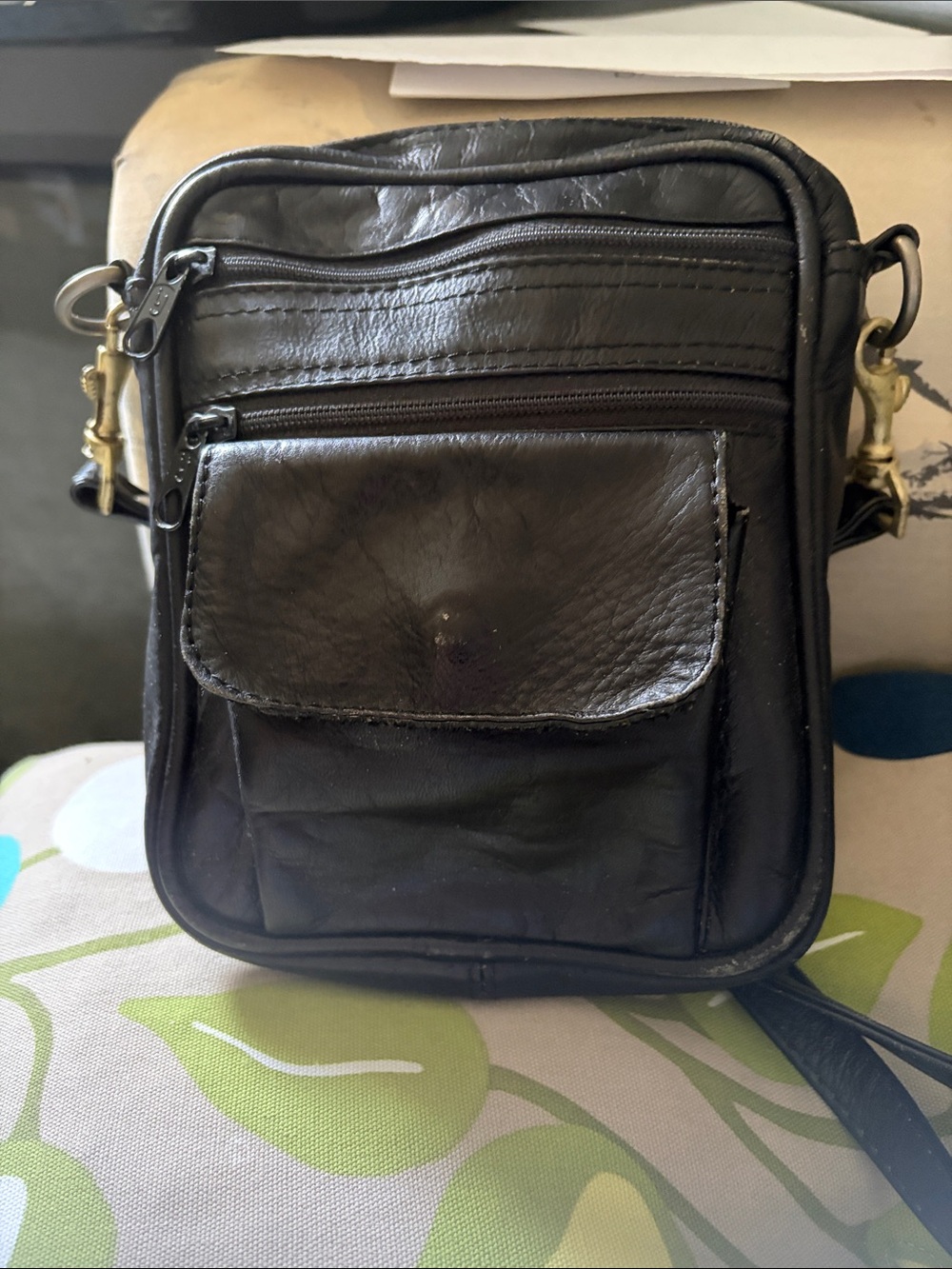 Queros , Black Leather Compact Crossbody Bag with Front Flap Pocket